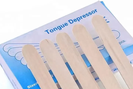 Depressor til disponible træ tunge